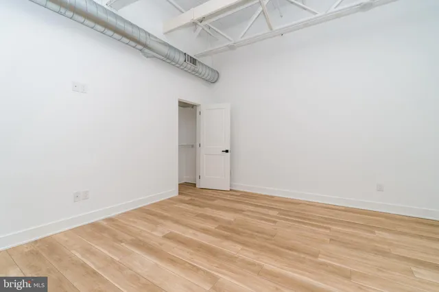 a kitchen with stainless steel appliances a sink cabinets and a counter top space