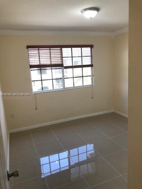 15430 Southwest 284th Street, Unit 6307 Homestead, FL 33033 - Photo 7 of 17 view of an empty room with a window