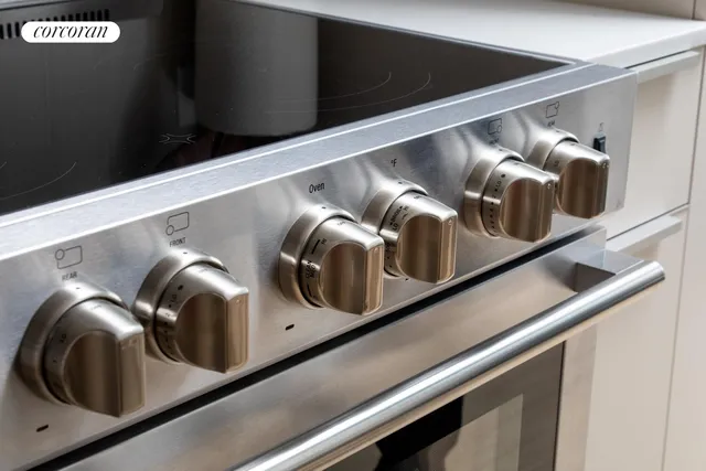 a kitchen with a sink and a refrigerator