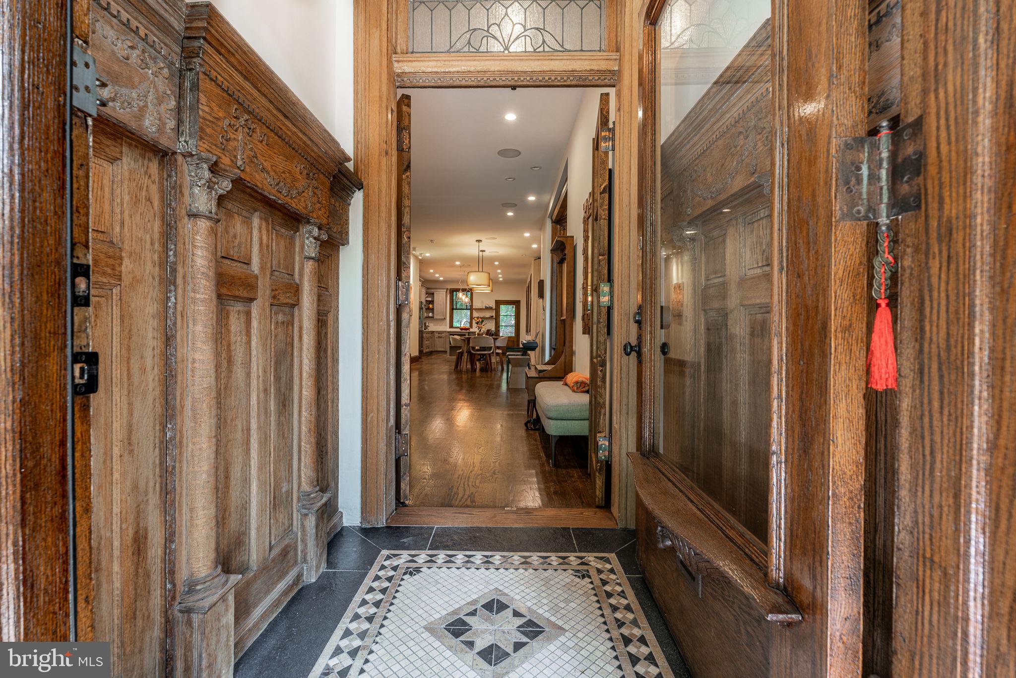239 South 46th Street Philadelphia, PA 19139 - Photo 2 of 34 a view of a hallway with a door and couch