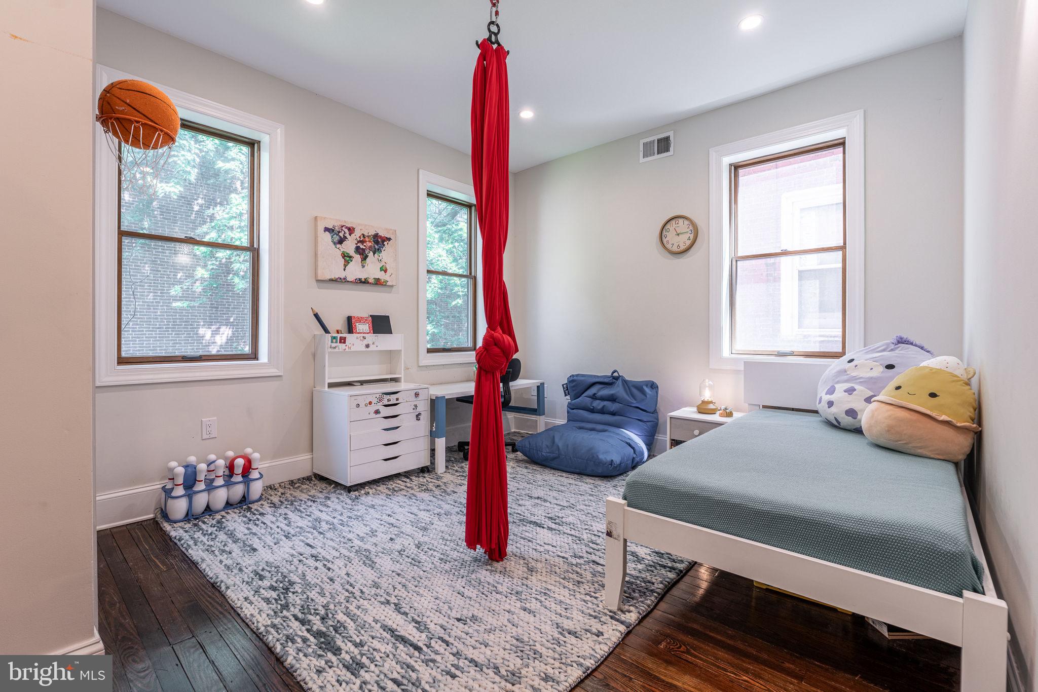 239 South 46th Street Philadelphia, PA 19139 - Photo 21 of 34 a bedroom with furniture and a window