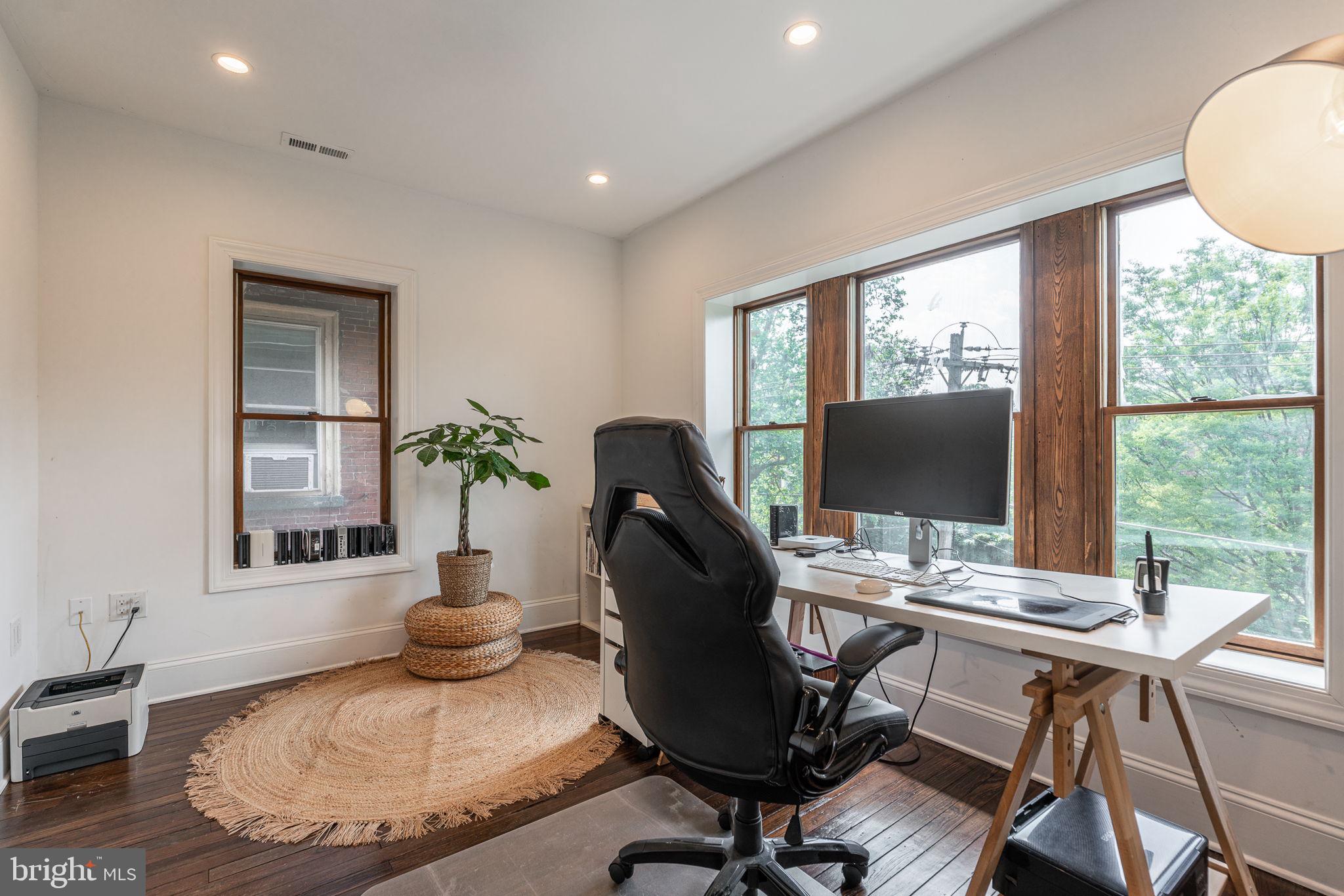 239 South 46th Street Philadelphia, PA 19139 - Photo 23 of 34 a workspace with furniture hardwood and a window