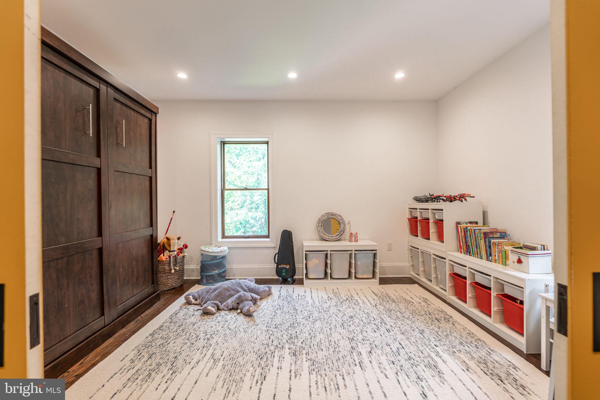 239 South 46th Street Philadelphia, PA 19139 - Photo 26 of 34 a bedroom with furniture and a window