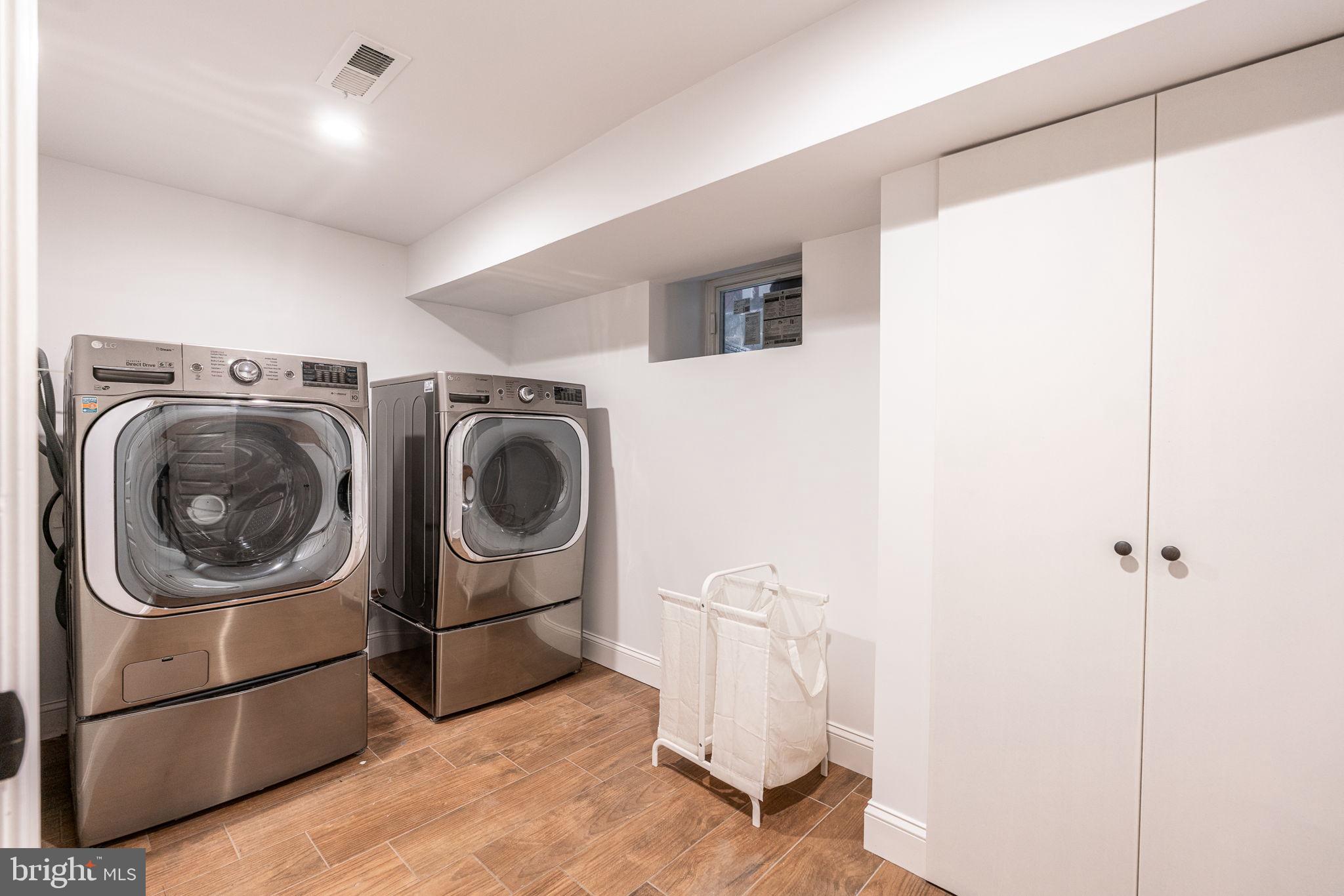 239 South 46th Street Philadelphia, PA 19139 - Photo 28 of 34 a utility room with dryer and washer