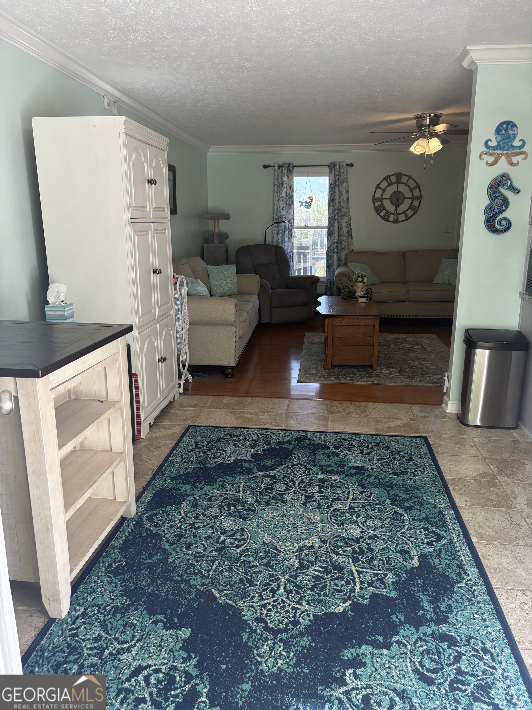 206 Oxford Road Griffin, GA 30223 - Photo 14 of 34 a living room with furniture and a rug