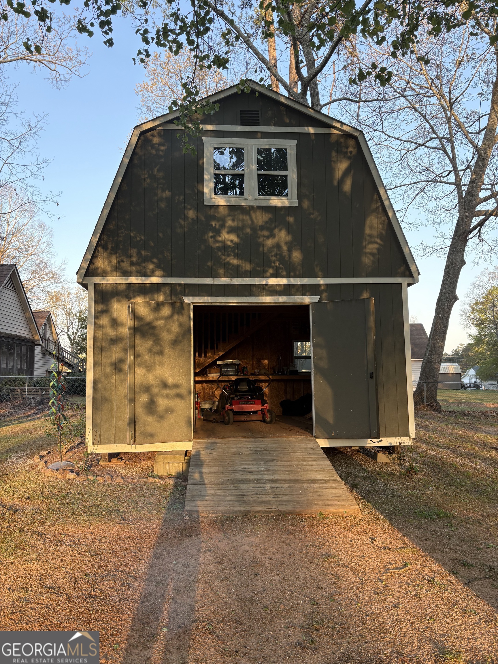 206 Oxford Road Griffin, GA 30223 - Photo 23 of 34 a front view of a house with a garage