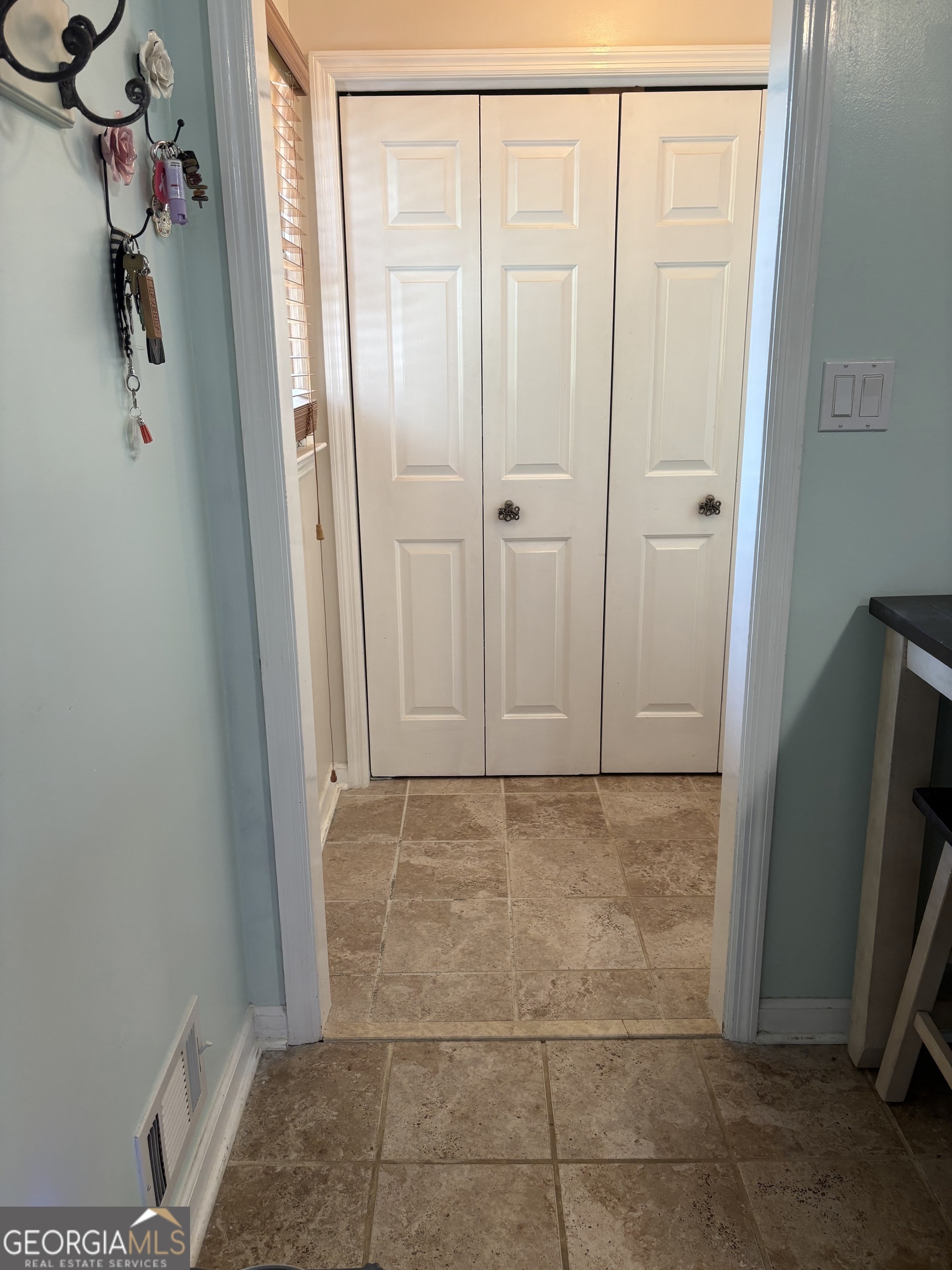 206 Oxford Road Griffin, GA 30223 - Photo 26 of 34 a bathroom with a glass shower door