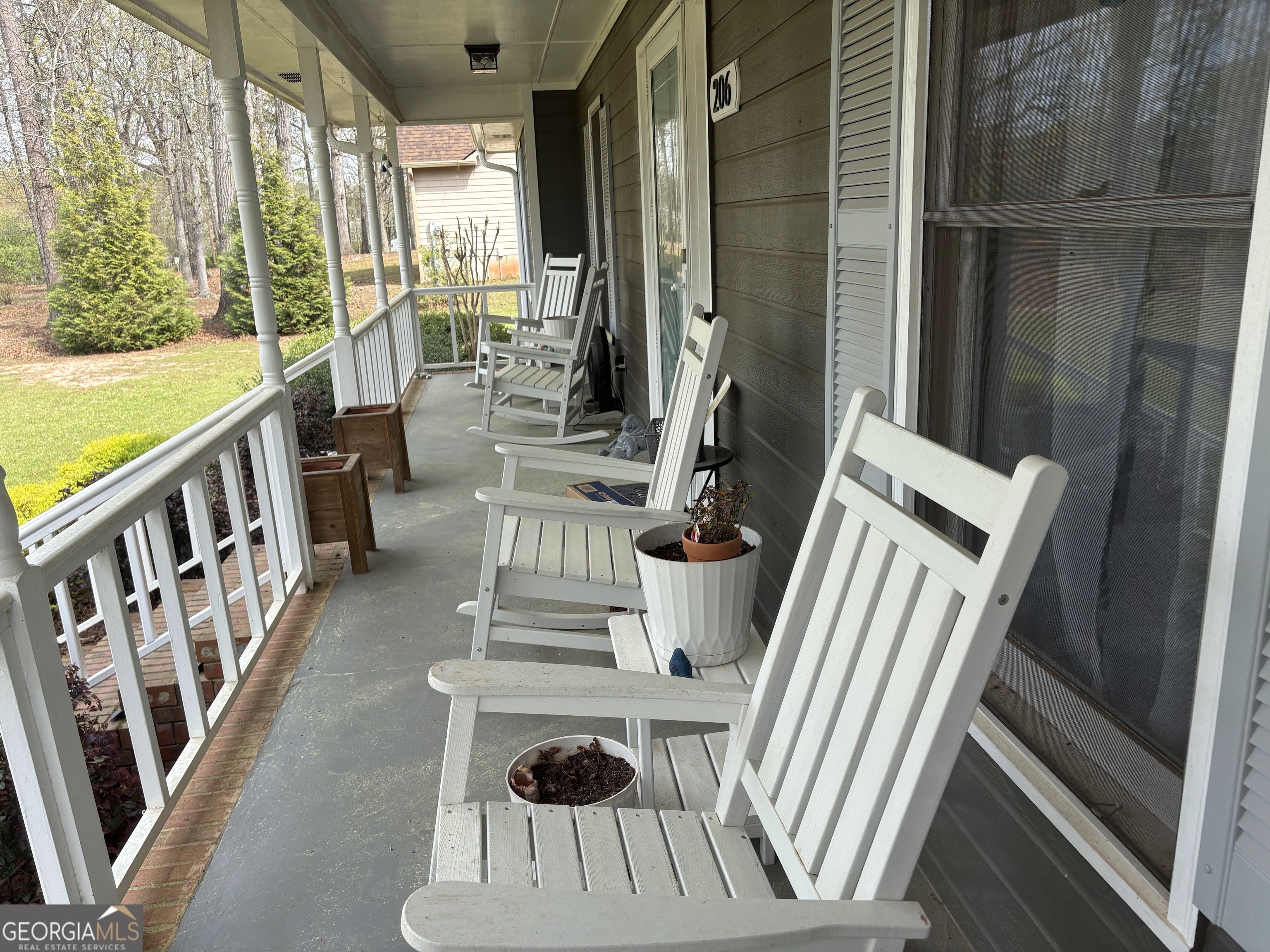 206 Oxford Road Griffin, GA 30223 - Photo 3 of 34 a view of an entryway with wooden floor