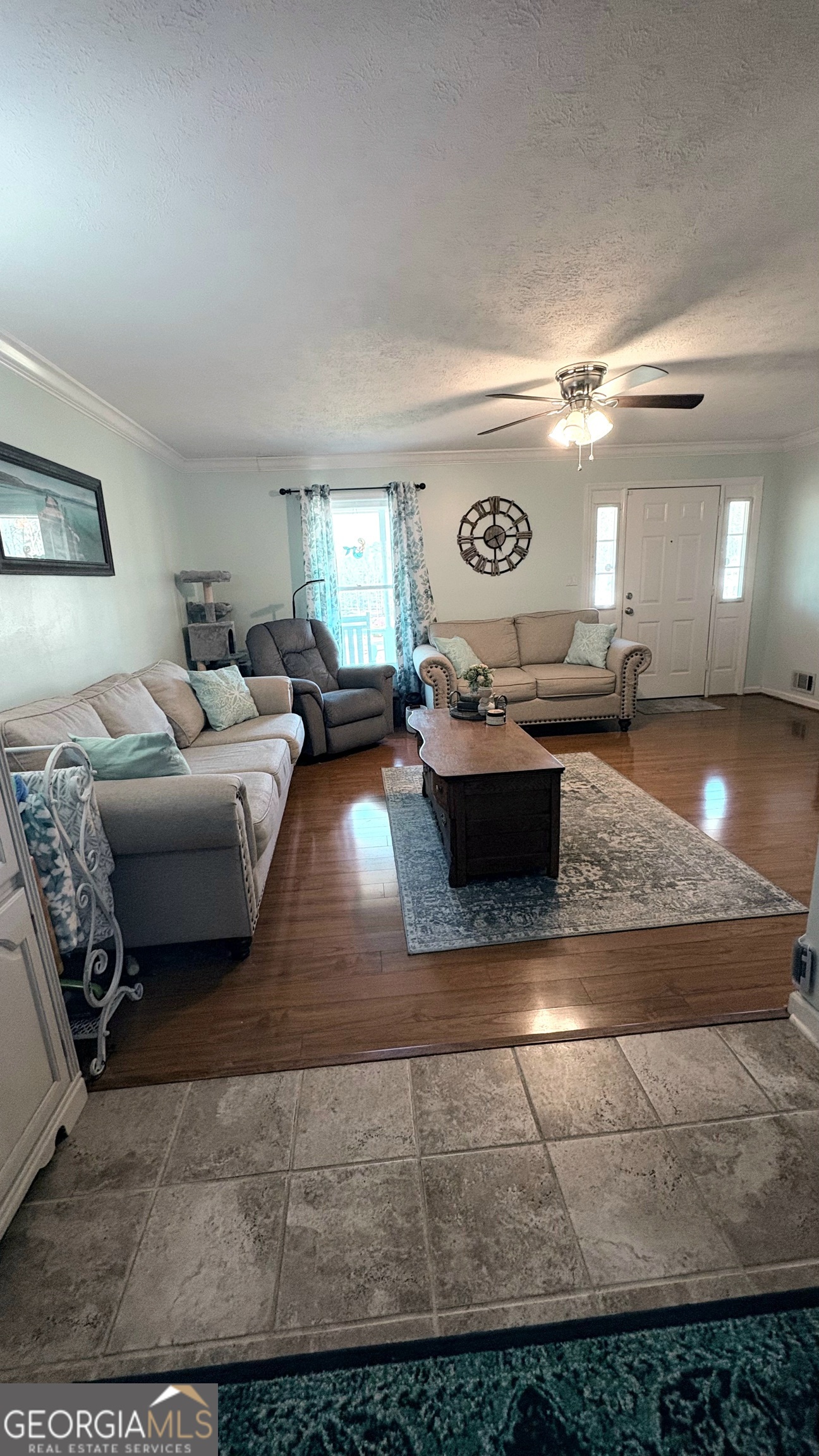 206 Oxford Road Griffin, GA 30223 - Photo 8 of 34 a living room with furniture and a window
