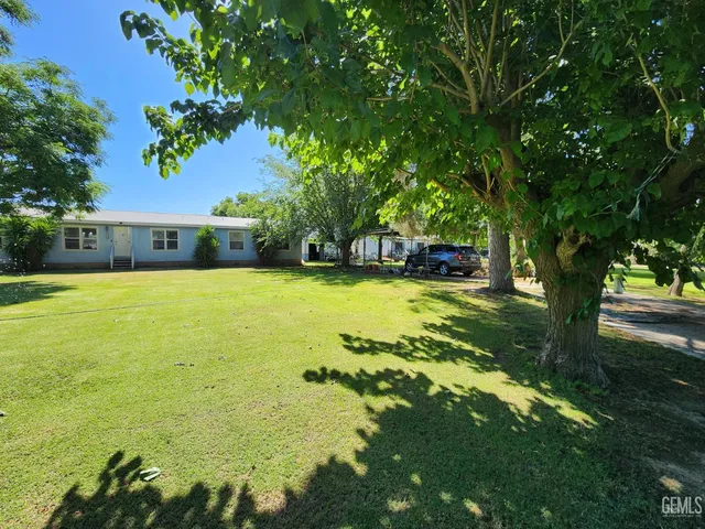 a view of a lake with a house
