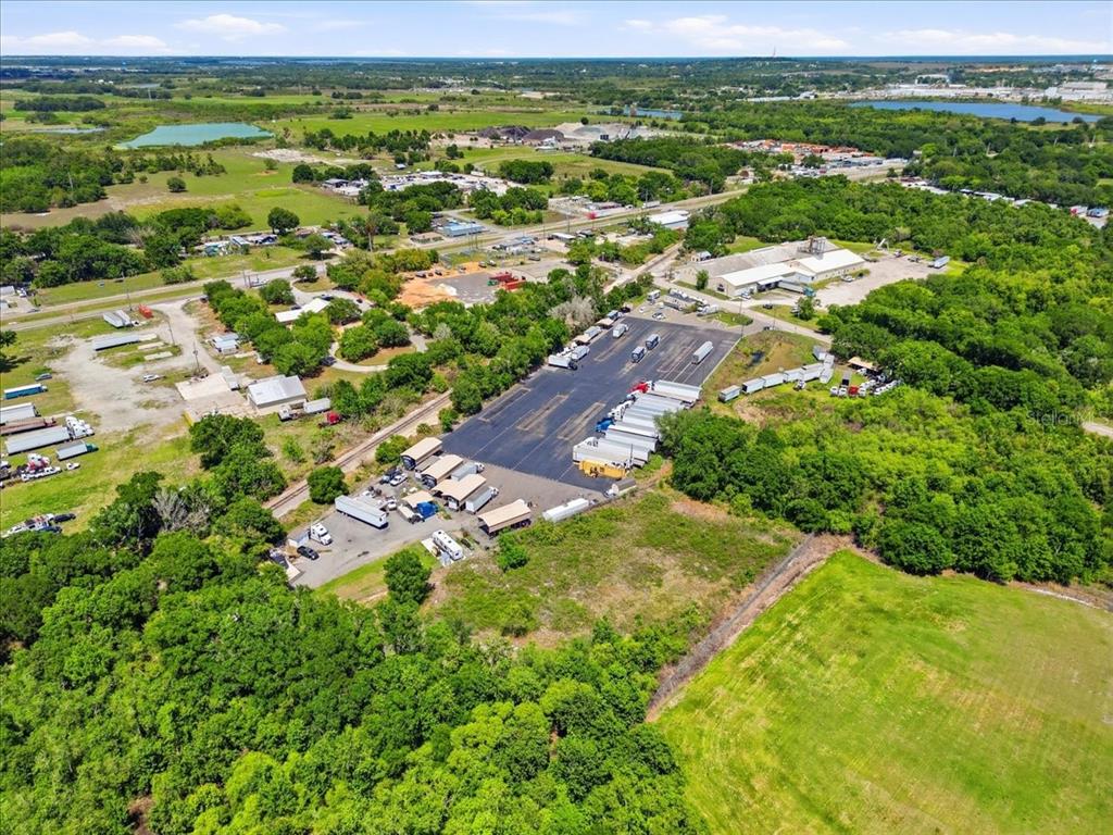 100 South Airport Road Lake Wales, FL 33859 - Photo 14 of 28 a view of a city with lush green forest