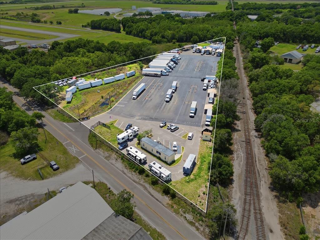 100 South Airport Road Lake Wales, FL 33859 - Photo 2 of 28 an aerial view of a city