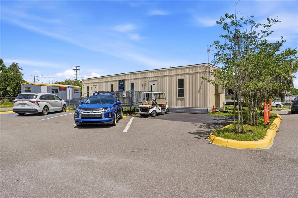 100 South Airport Road Lake Wales, FL 33859 - Photo 21 of 28 a view of a street with cars park