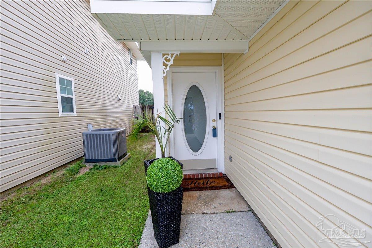 3256 Two Sisters Way Pensacola, FL 32505 - Photo 2 of 40 a view of a chair with a backyard