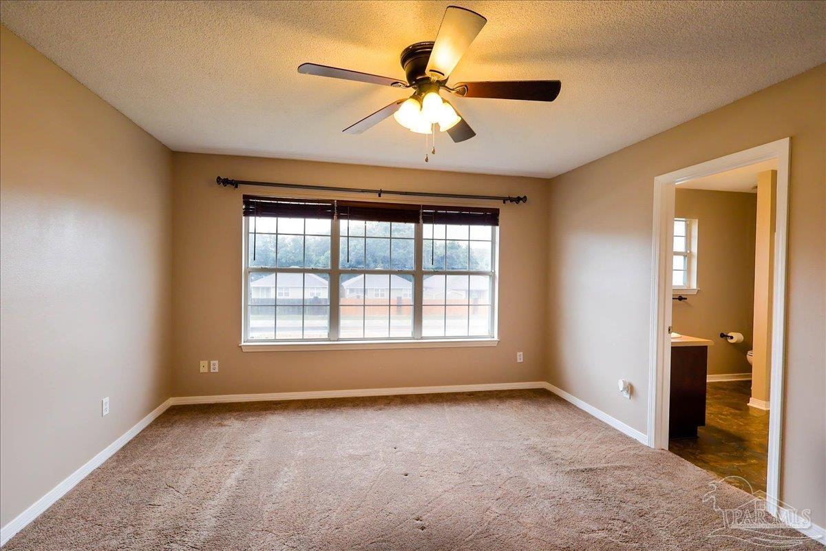 3256 Two Sisters Way Pensacola, FL 32505 - Photo 23 of 40 a view of an empty room with a window