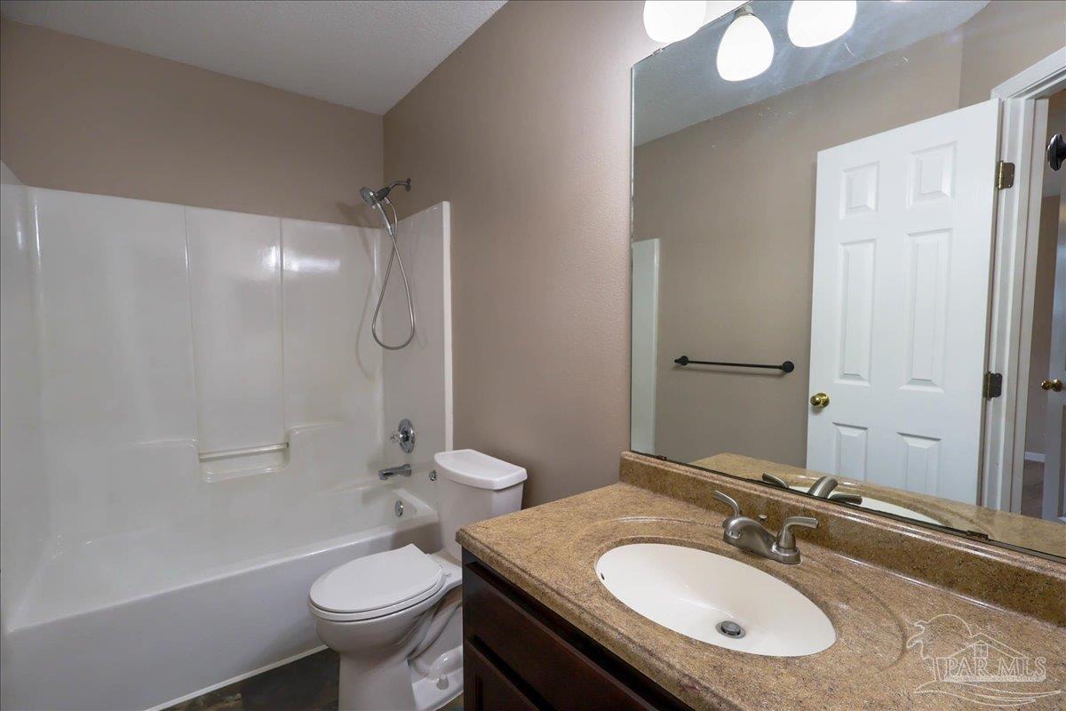 3256 Two Sisters Way Pensacola, FL 32505 - Photo 31 of 40 a bathroom with a sink toilet and shower