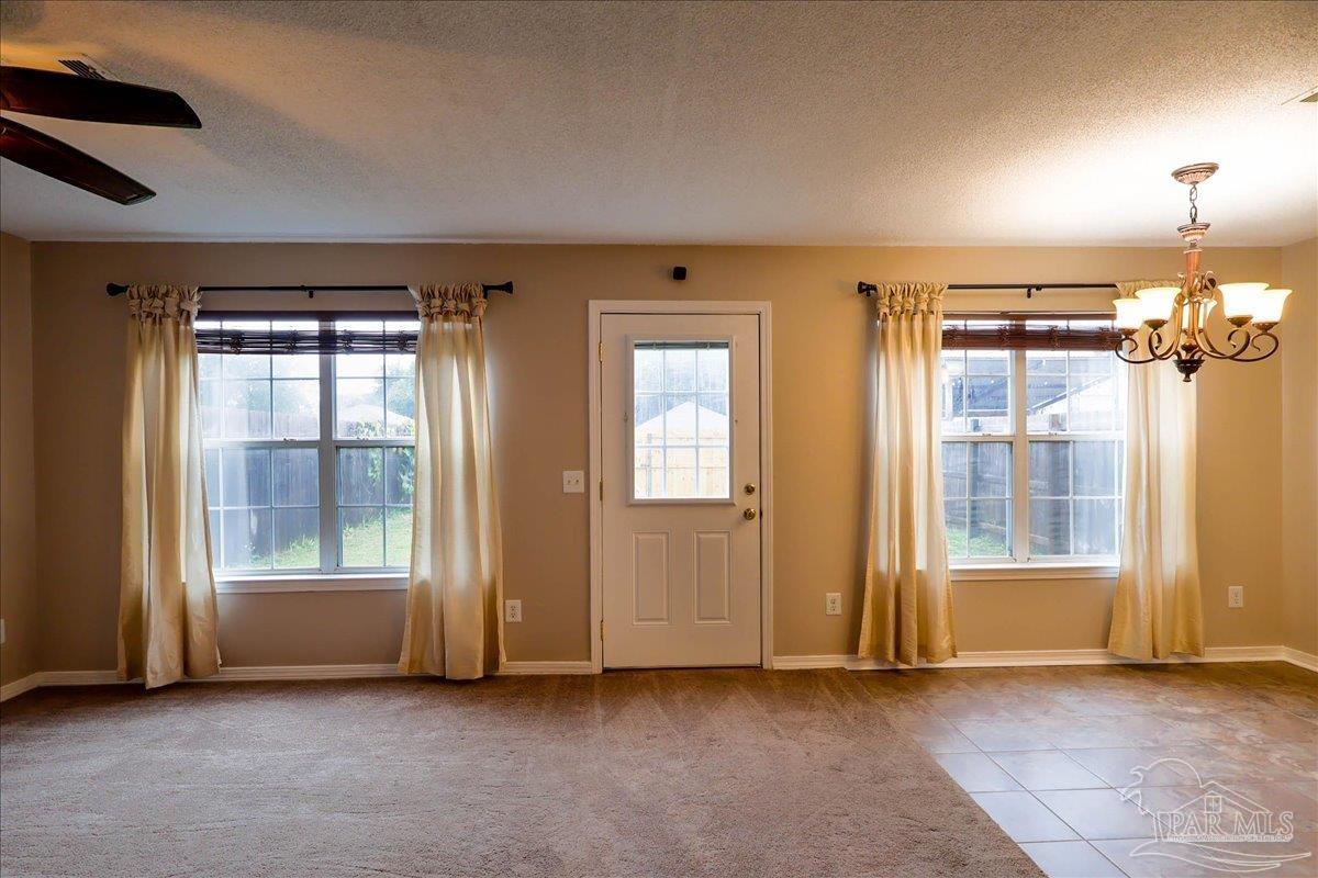 3256 Two Sisters Way Pensacola, FL 32505 - Photo 5 of 40 an empty room with windows and closet