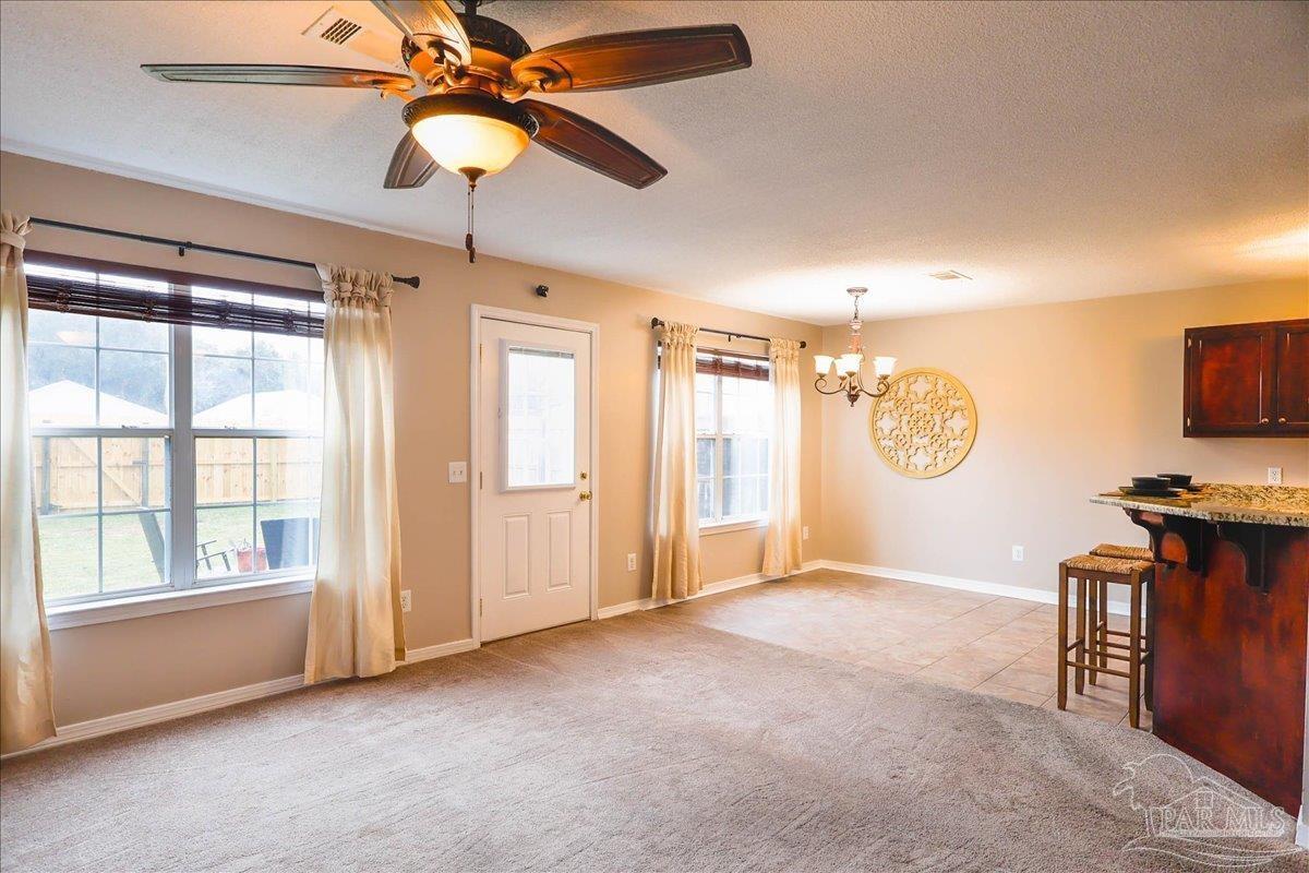 3256 Two Sisters Way Pensacola, FL 32505 - Photo 7 of 40 a view of livingroom with hardwood floor and a ceiling fan