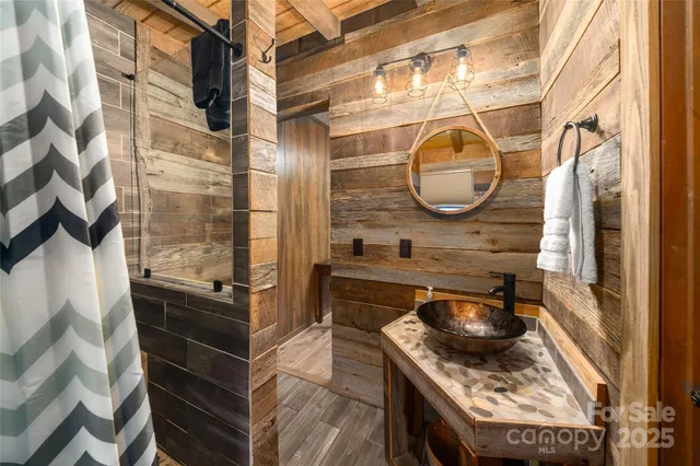 a bedroom with bed and a window