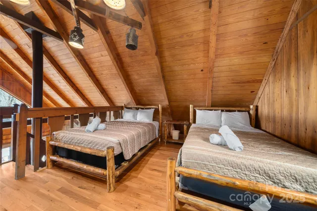 a bedroom with bed and a window