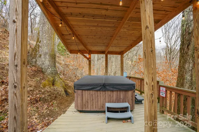 a view of balcony with wooden floor