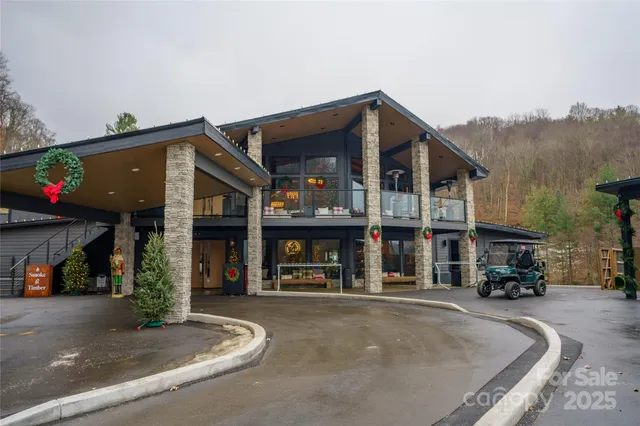 a view of swimming pool with a lounge chairs