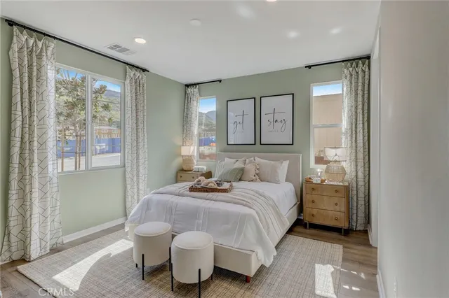 a bathroom with a sink a mirror and shower