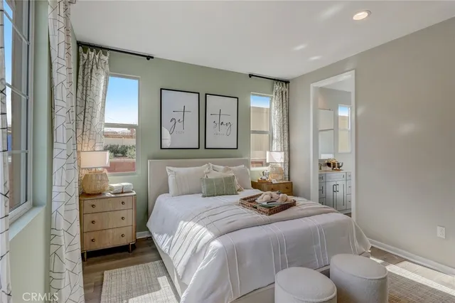 a bathroom with a toilet a sink and a mirror