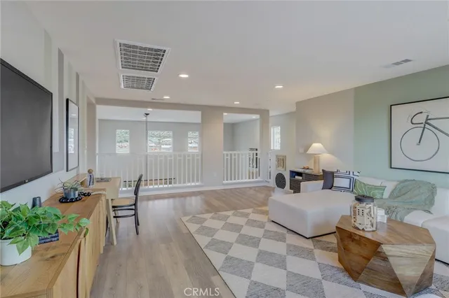 a bedroom with a bed and a mirror