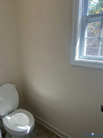 a view of bathroom with a toilet