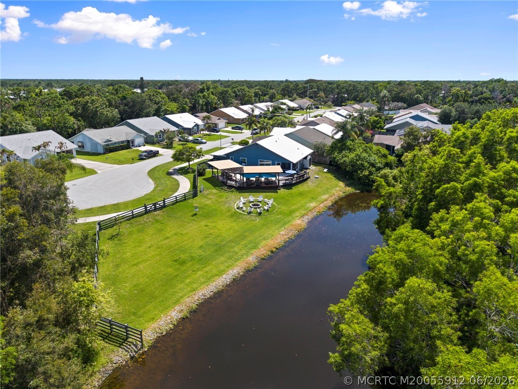 4401 Southeast Satinleaf Place Stuart, FL 34997 - Photo 44 of 51 Ariel of Home, Lake, and Lot