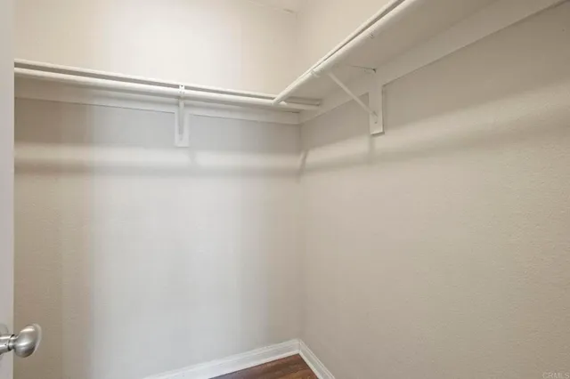 a view of a room with racks on the wall