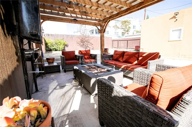 a view of balcony with furniture and a window