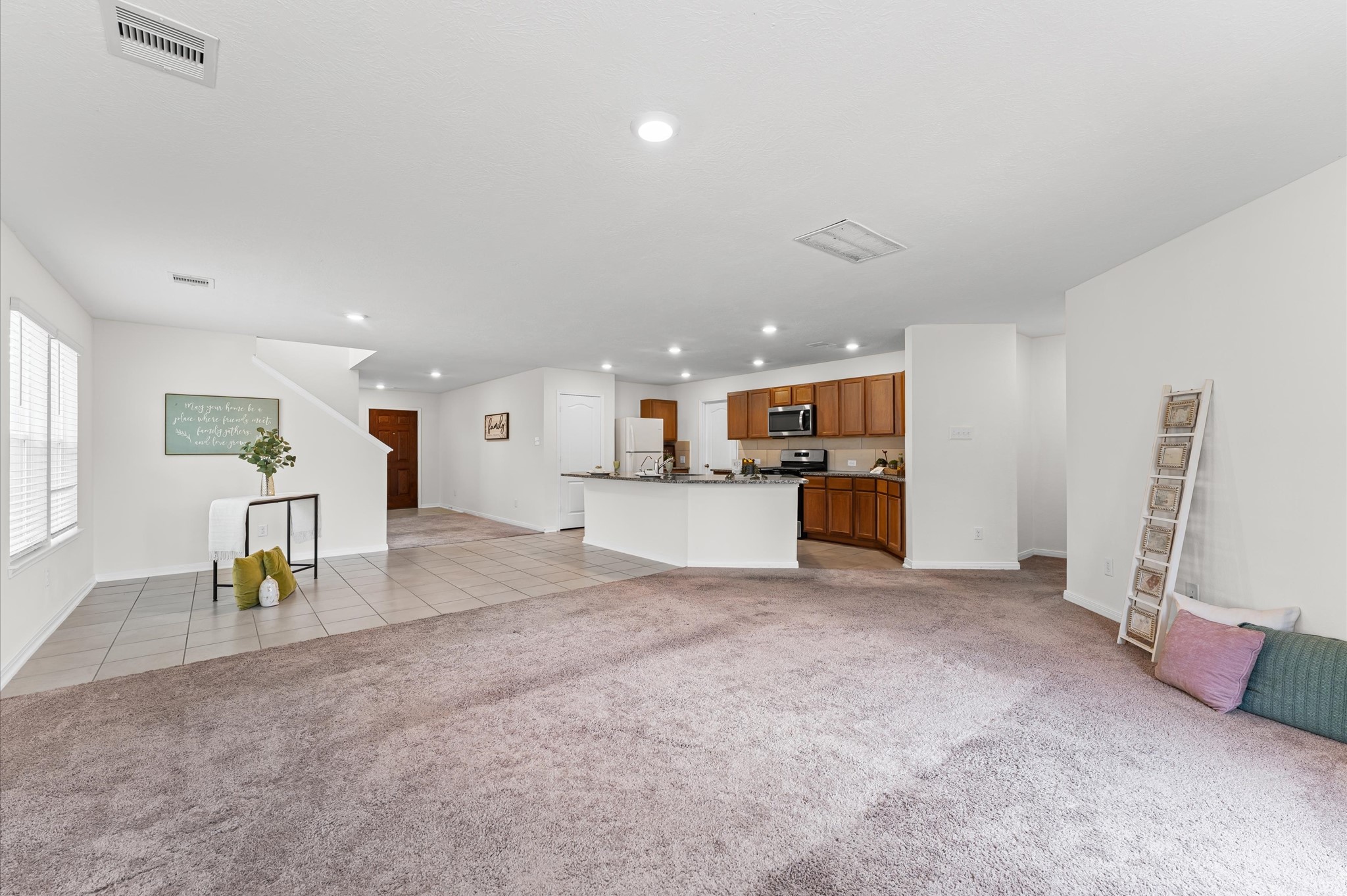 5031 Gazelle Leap Lane Richmond, TX 77406 - Photo 30 of 30 a view of kitchen with furniture and a refrigerator