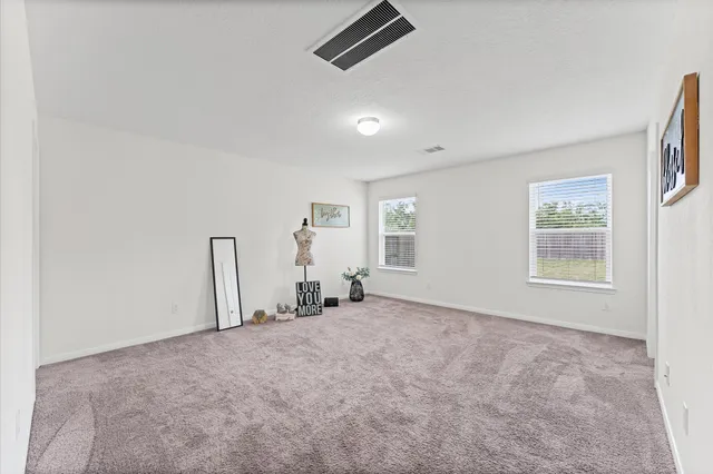 a bathroom with a sink toilet and a mirror