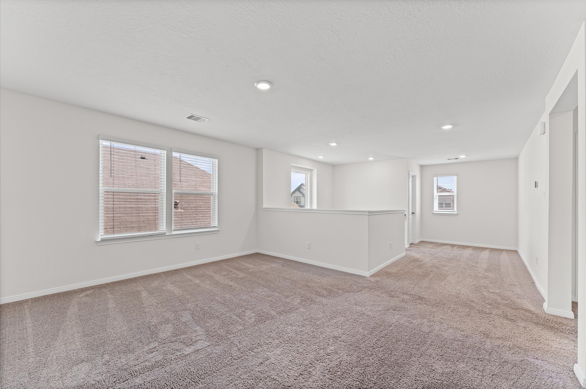 5031 Gazelle Leap Lane Richmond, TX 77406 - Photo 23 of 30 a view of an empty room with a window