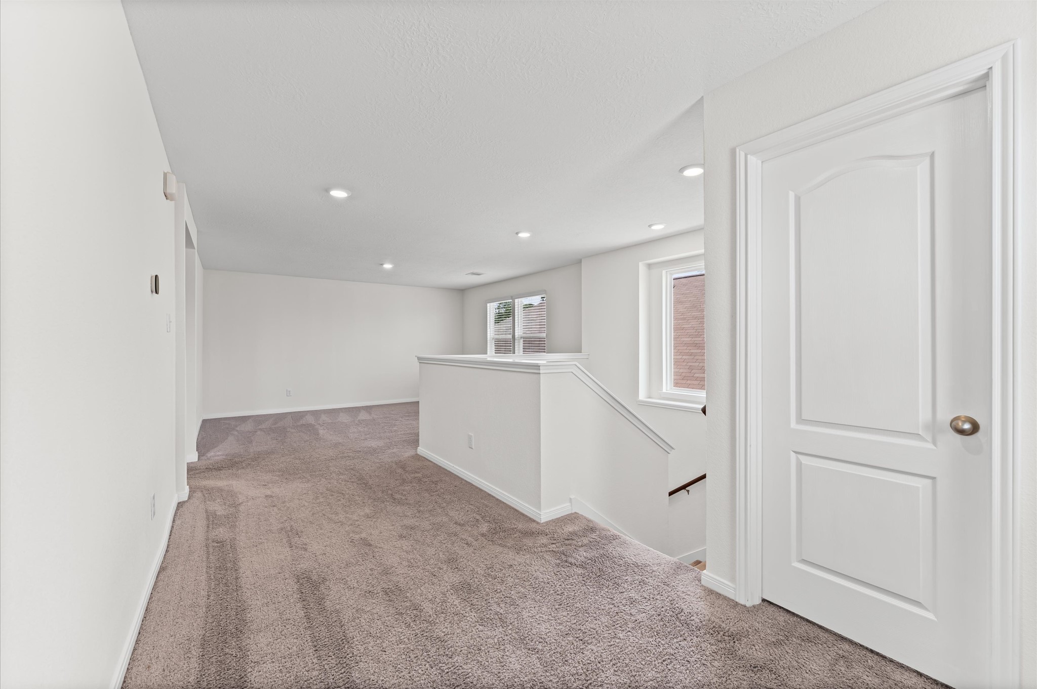 5031 Gazelle Leap Lane Richmond, TX 77406 - Photo 25 of 30 a view of a kitchen with white cabinets