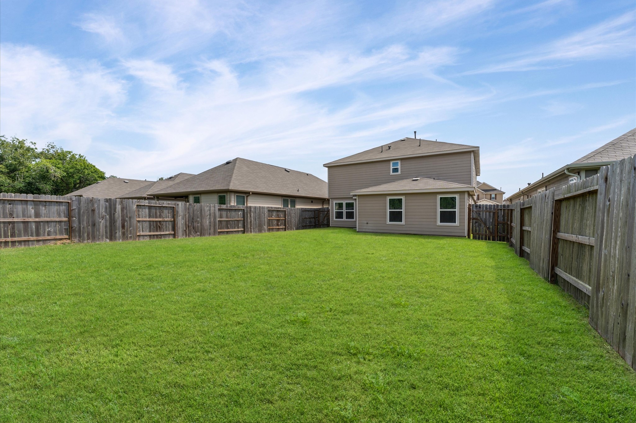5031 Gazelle Leap Lane Richmond, TX 77406 - Photo 27 of 30 a front view of a house with a garden