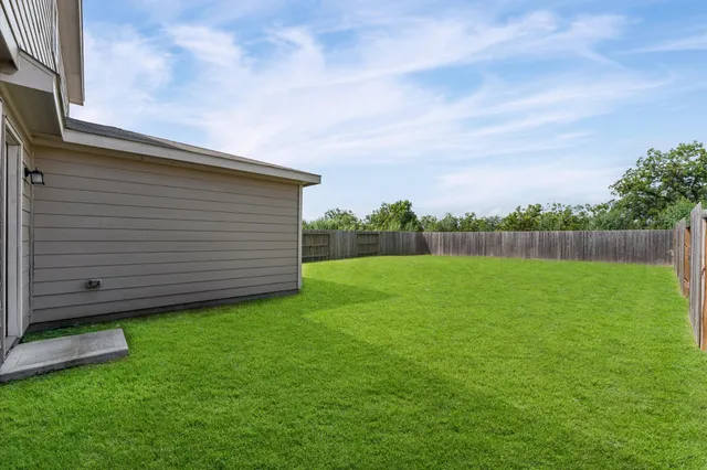 a front view of house with yard