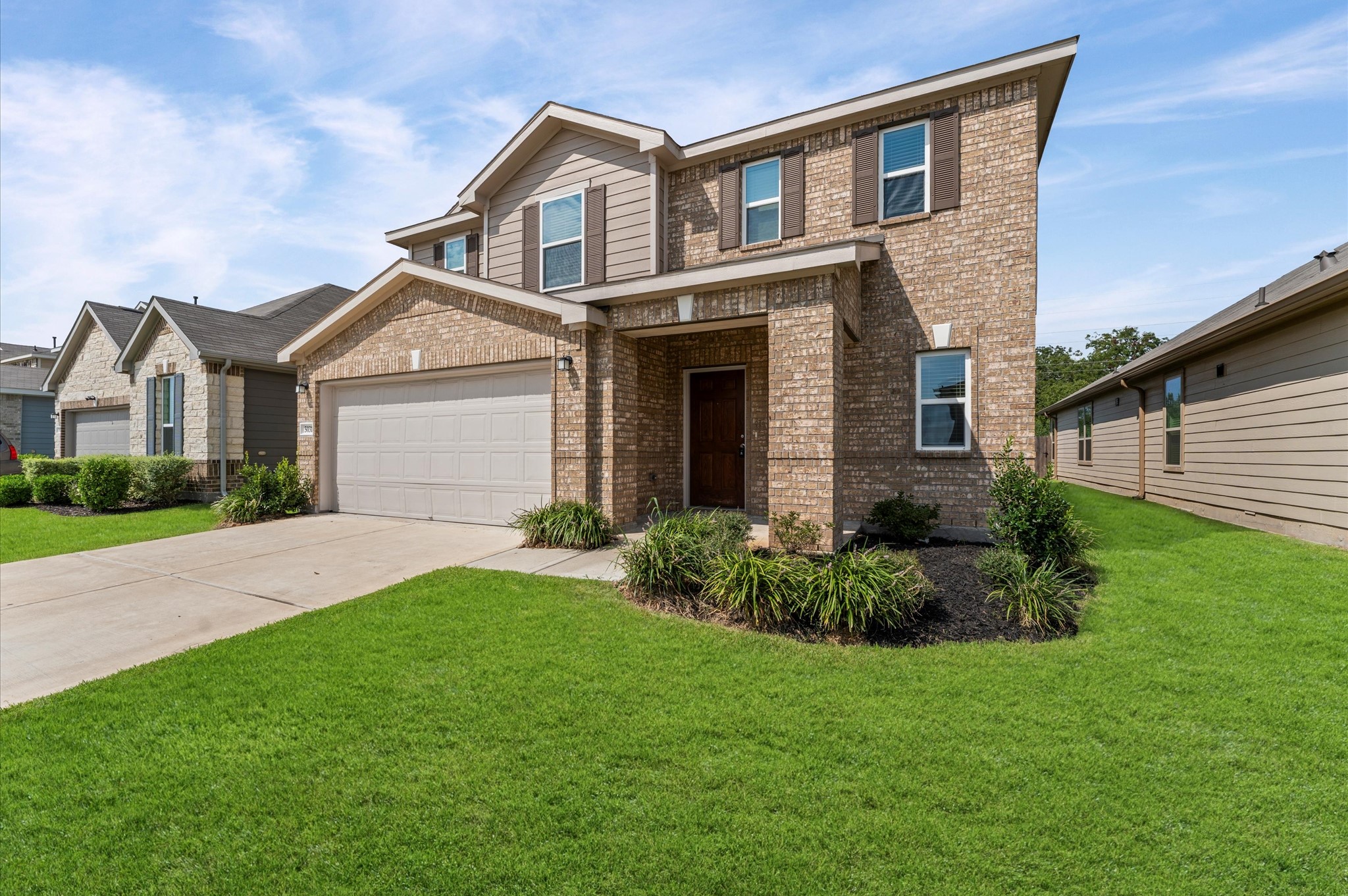 5031 Gazelle Leap Lane Richmond, TX 77406 - Photo 3 of 30 a front view of a house with a garden