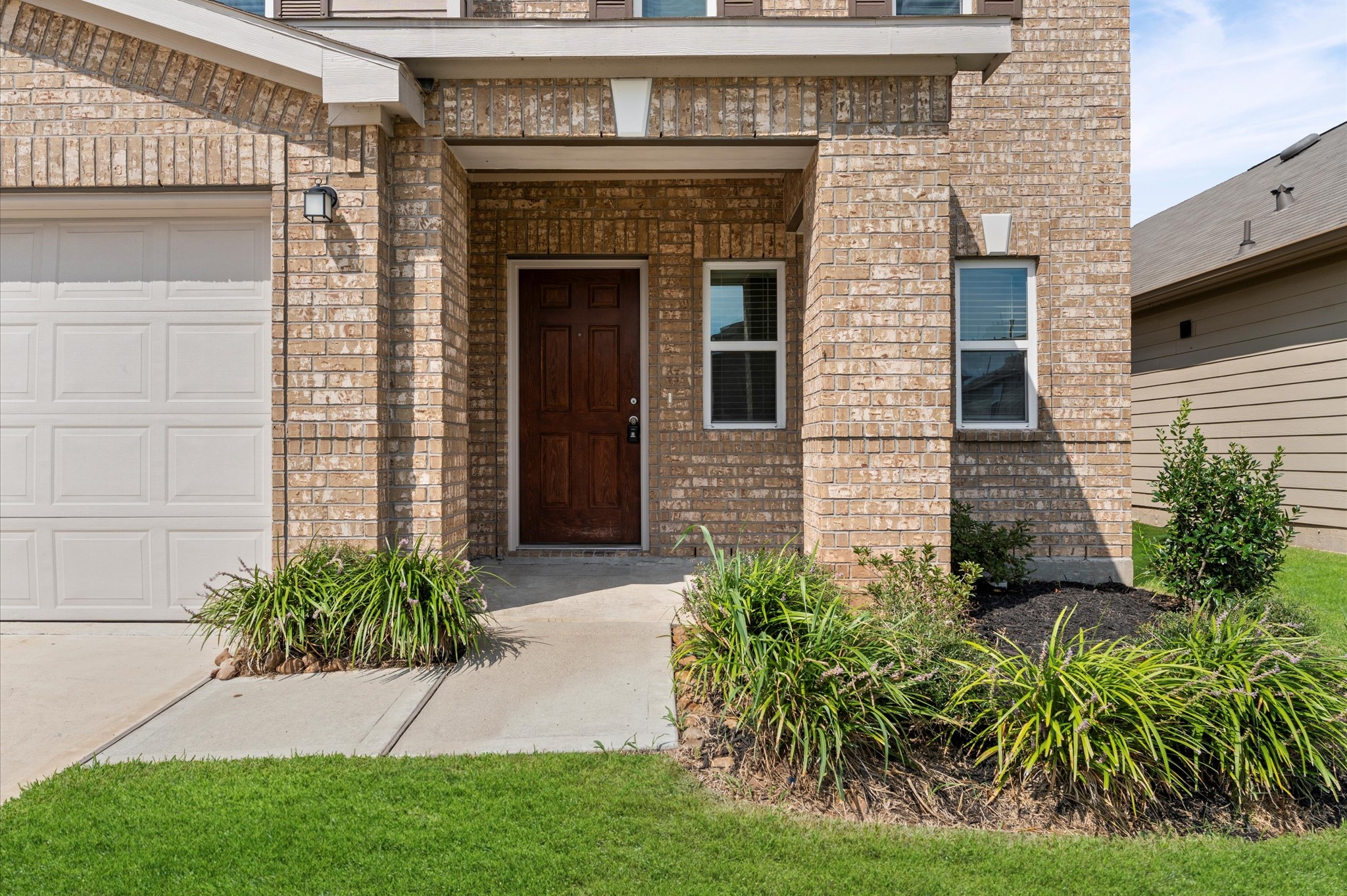 5031 Gazelle Leap Lane Richmond, TX 77406 - Photo 4 of 30 a front view of a house with garden