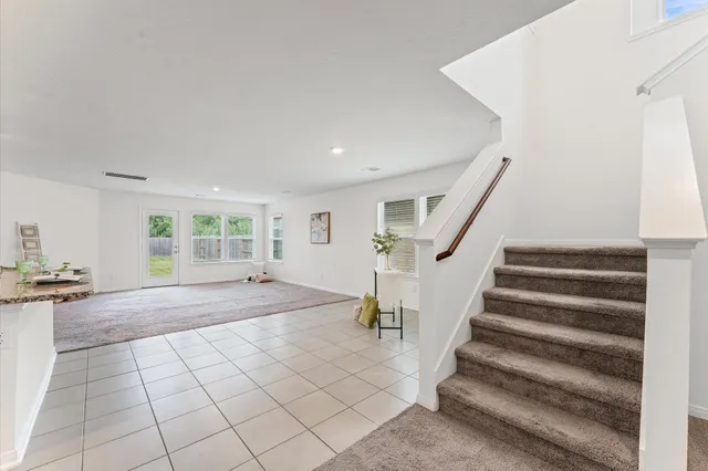 a view of an entryway with staircase