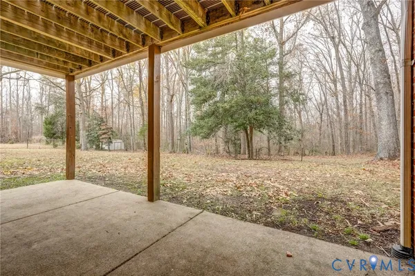 a house view with a backyard space