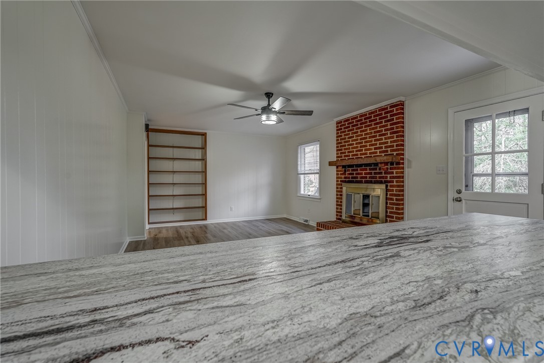 3534 Davis Mill Road Goochland, VA 23063 - Photo 25 of 40 an empty room with windows and fireplace