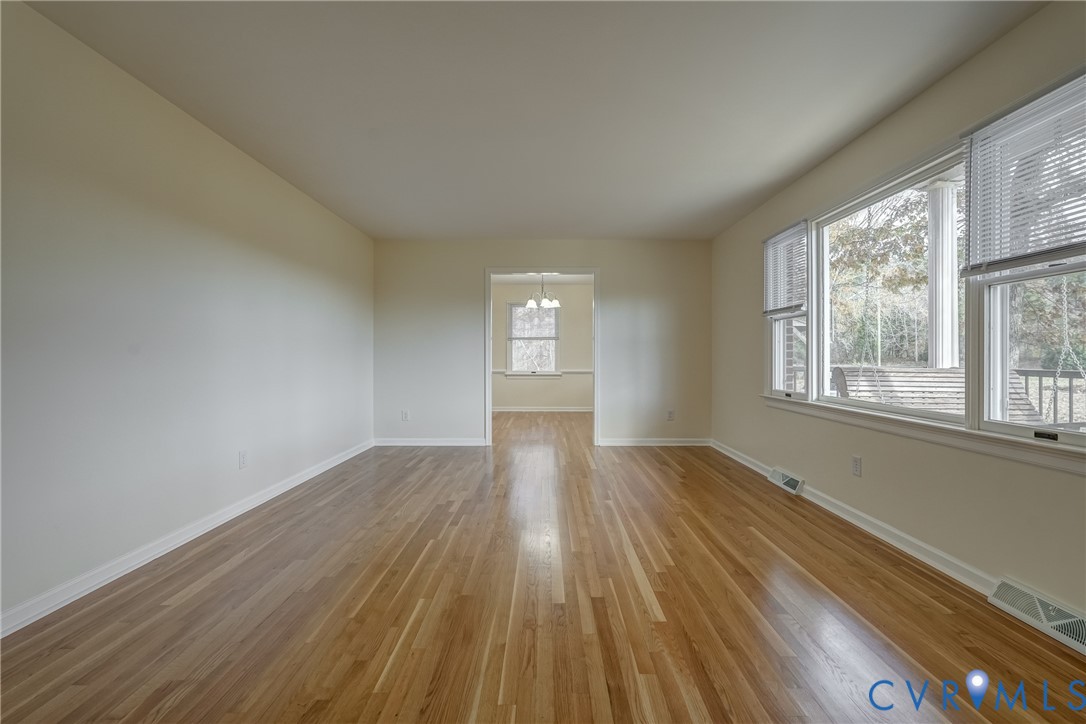 3534 Davis Mill Road Goochland, VA 23063 - Photo 33 of 40 an empty room with wooden floor and windows