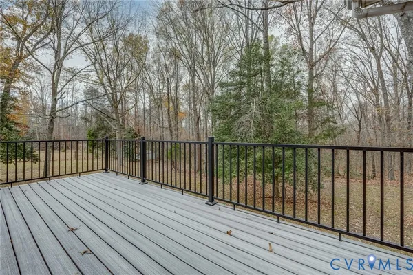 a balcony with wooden floor