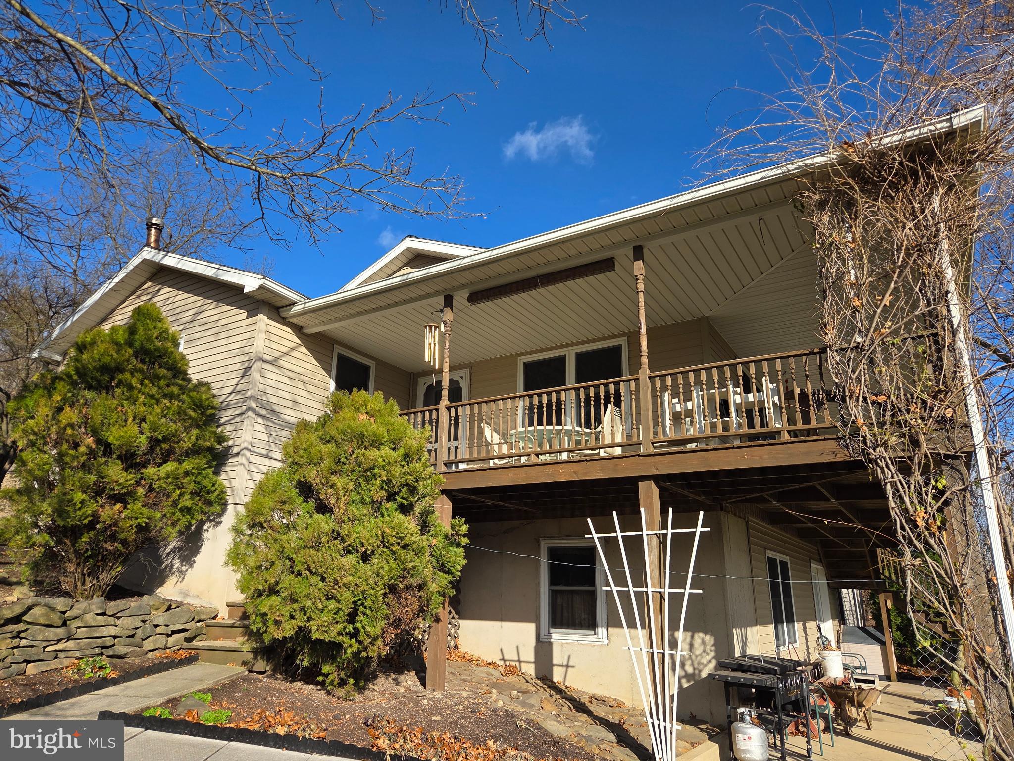 83 Woodpecker Drive Mount Pleasant Mills, PA 17853 - Photo 57 of 87 Charming home with inviting porch and greenery.