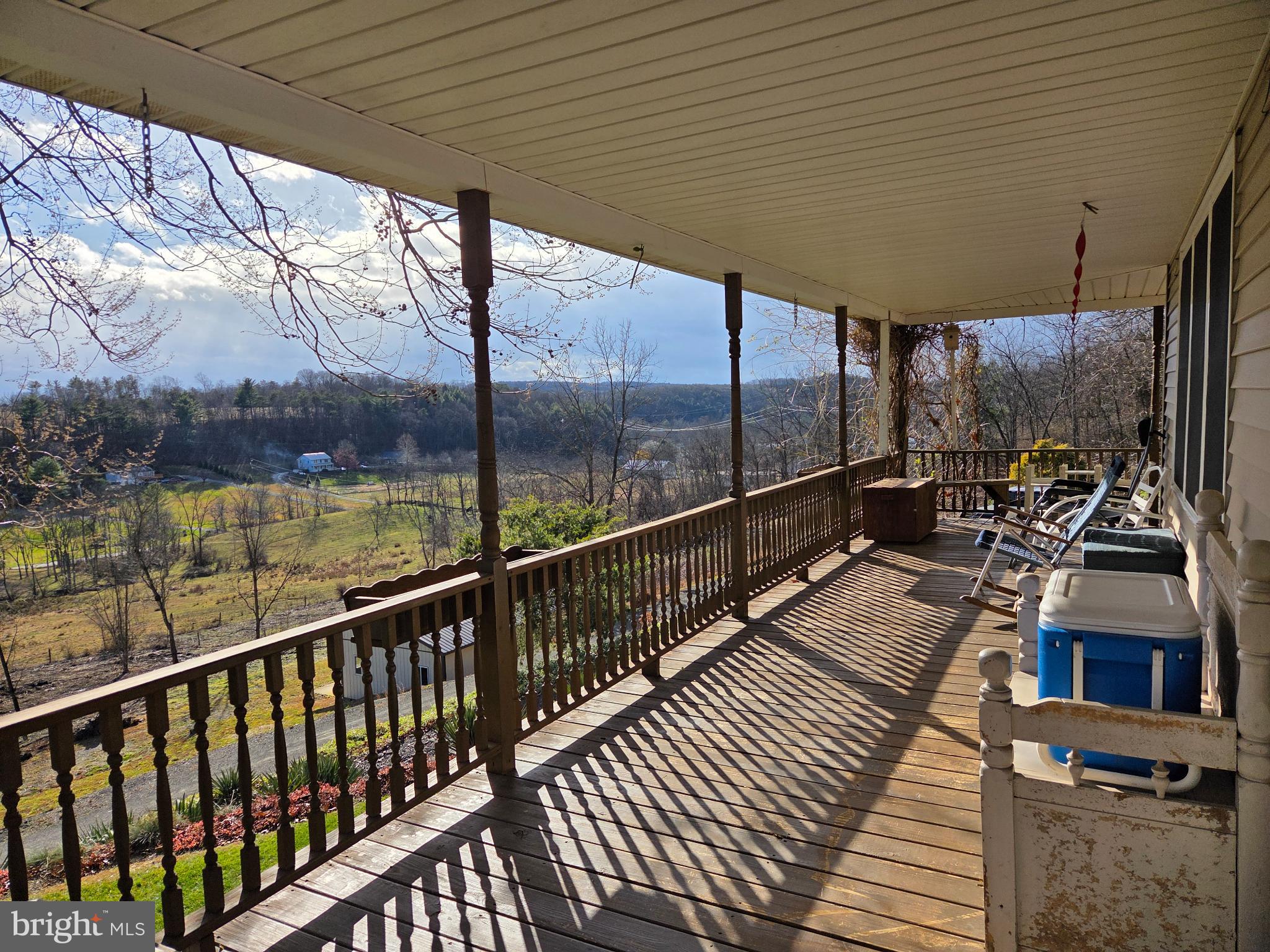 83 Woodpecker Drive Mount Pleasant Mills, PA 17853 - Photo 58 of 87 Serene porch with scenic countryside views.