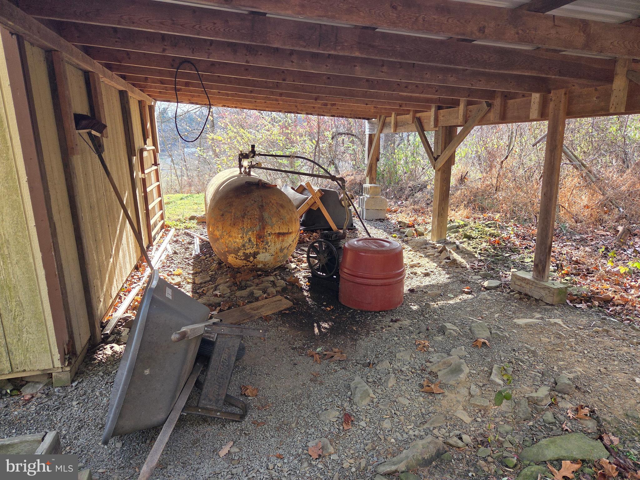 83 Woodpecker Drive Mount Pleasant Mills, PA 17853 - Photo 67 of 87 Rustic storage space with vintage tools.