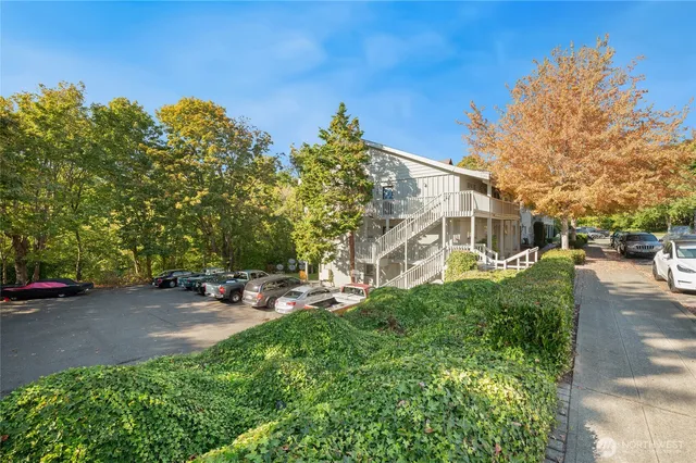 an aerial view of a house with a yard